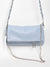 bolso de piel azul claro con dos cadenas Hemera Studios